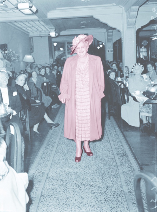 10D Woman modelling in a fashion parade for outsize women at James Smith's department store 1950 edit copy